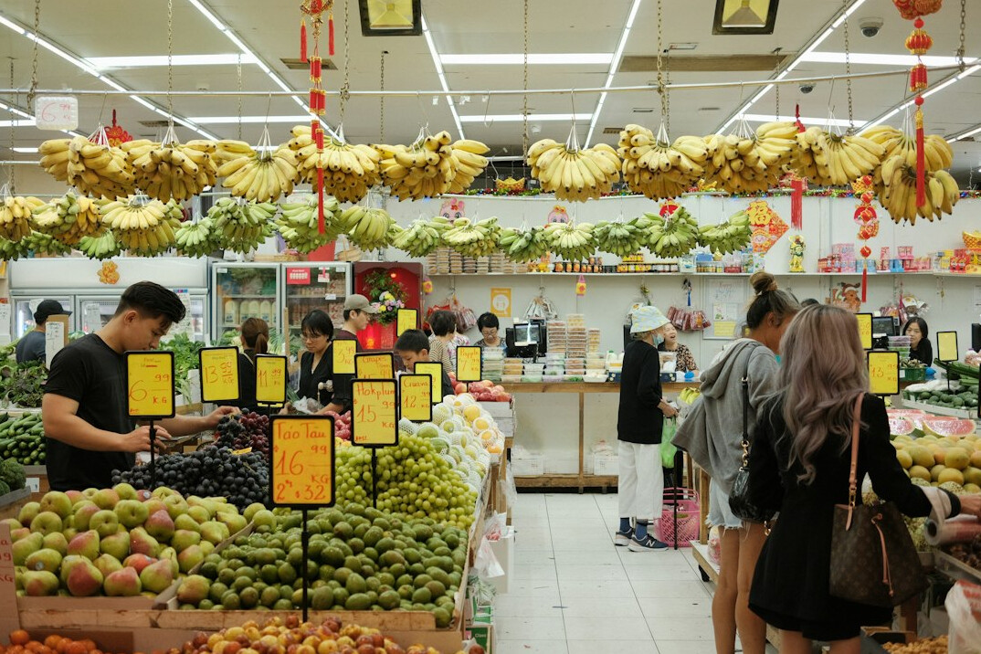 security officer in busy supermarket